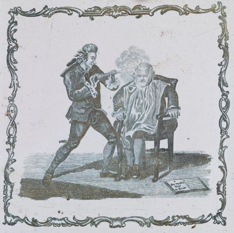 Tile. In grey against a white ceramic background, a chubby man has his hair or wig sprayed by a grinning thin man wearing a suit. The man receiving treatment has his eyes screwed shut, hands braced against the arms of his chair, and his clothing is covered by a sheet. A swirling frame surrounds the scene.